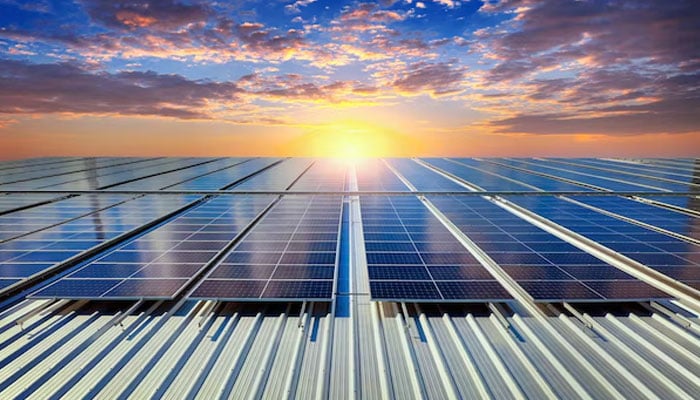 An undated image of solar plates installed at a roof. — Freepik