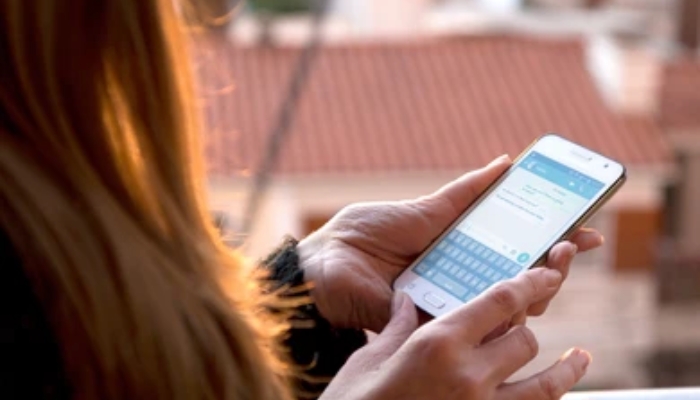An undated image of a person using WhatsApp. — Shutterstock