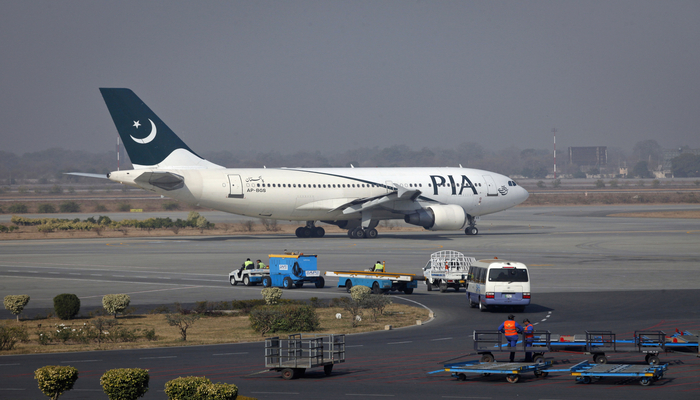 A PIA plane prepares to take-off at Alama Iqbal International Airport in Lahore February 1, 2012. — Reuters