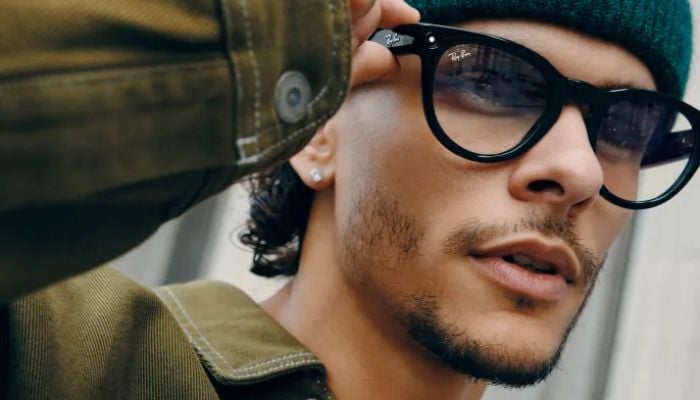 An image of a person wearing Meta Ray-Ban smart glasses. — Meta Store