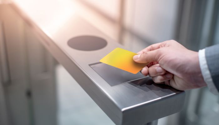 An undated image of a person using smart card. — Canva