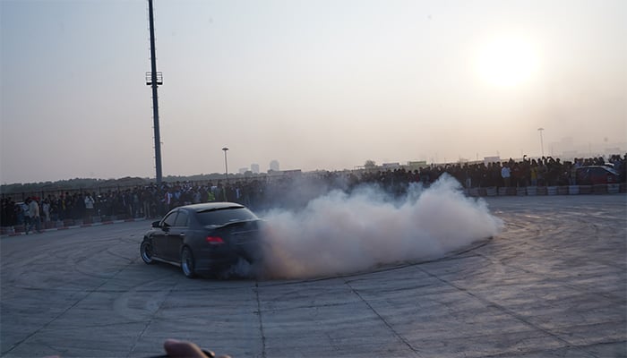 A car drifts at Pakwheels AutoShow in Karachi, on December 25. 2025. — Gadinsider via Syed Taha Nawaz
