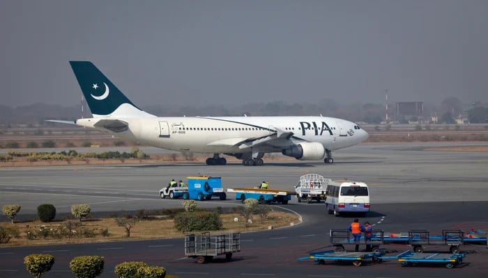A PIA plane prepares to take-off at Alama Iqbal International Airport in Lahore February 1, 2012. — Reuters