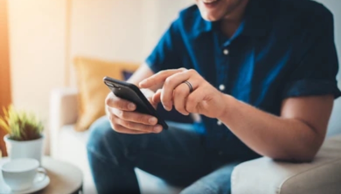 An undated image of a person usng a smartphone. — Shutterstock