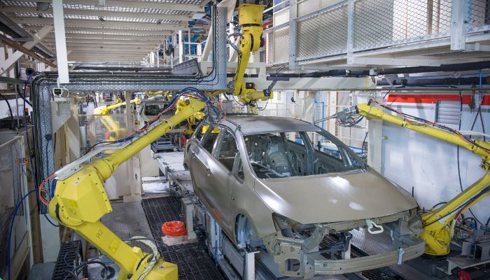 An undated image of a car under the manufacturing process. — Canva