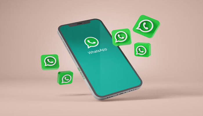 An undated image of WhatsApp displayed on a smartphone. — Adobe Stock