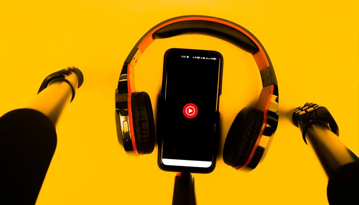An undated image of YouTube Music app logo displayed on a smartphone. — Pexels