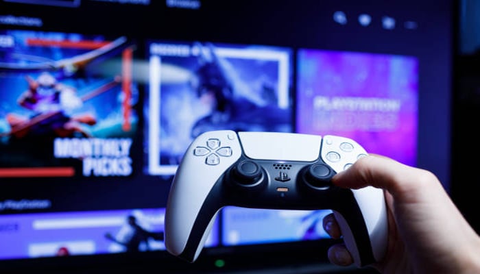 An undated image of a person playing on a PS5. — iStock