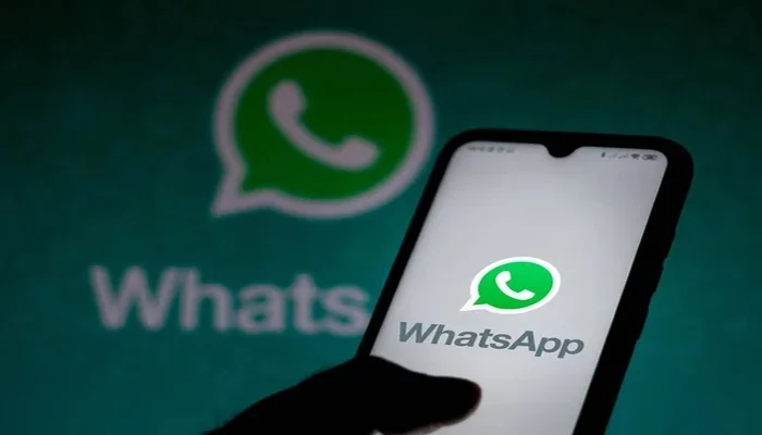 An undated image of WhatsApp logo displayed on smartphone and in the background. — Depositphotos