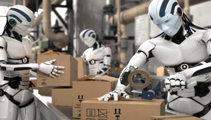An undated, representational image showing robots working. — iStock