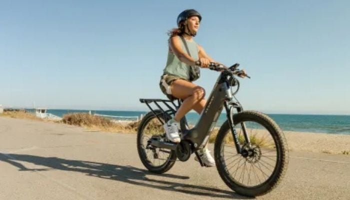 An undated image of a girl riding Segway new e-bike. — Segway