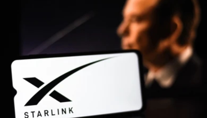 An undated image of Starlink logo with Elon Musk in the background. — Shutterstock