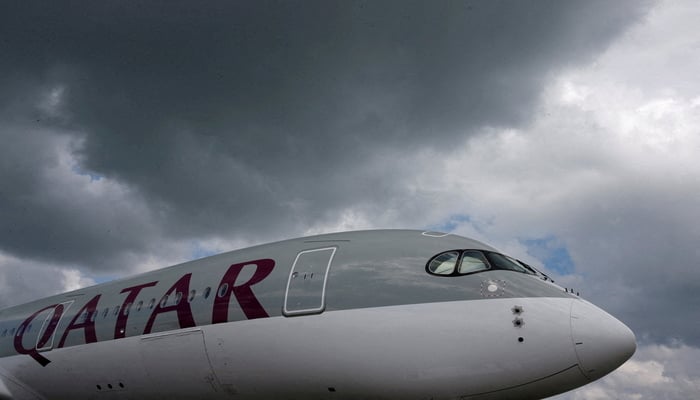 A Qatar Airways Airbus A350 XWB aircraft is displayed at the Singapore Airshow at Changi Exhibition Center February 18, 2016. — Reuters