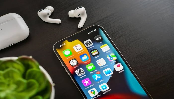 An undated image showing various apps on iPhone 13. — Depositphotos