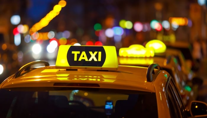 An undated image of a taxi logo. — Canva