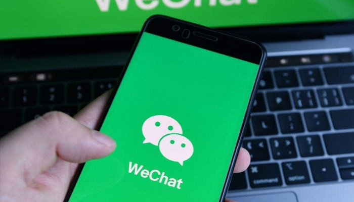 An undated image of WeChat app logo displayed on smartphone. — ShutterStock