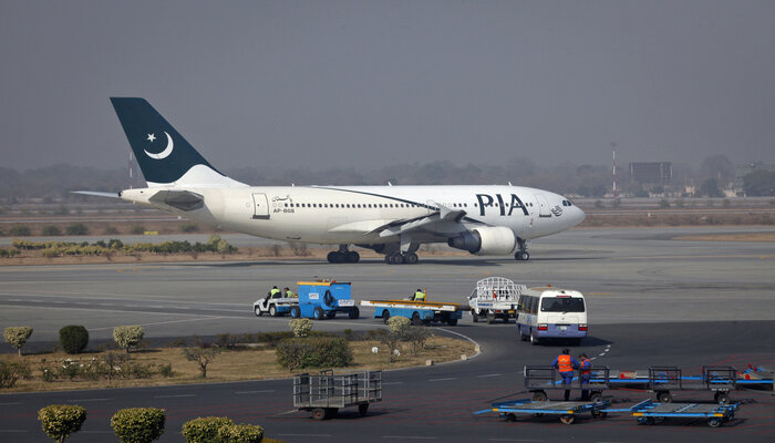 A PIA plane prepares to take-off at Alama Iqbal International Airport in Lahore February 1, 2012. — Reuters