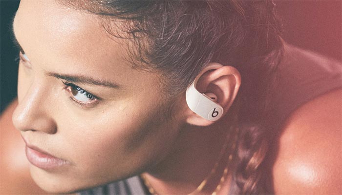 An undated image of a girl using Powerbeats Pro. — Apple