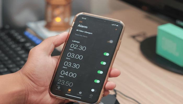 An undated image of alarm times displayed on iPhone. — Shutterstock