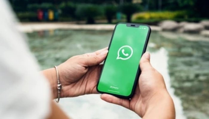 An undated image of a WhatsApp logo displayed on a smartphone. — Shutterstock