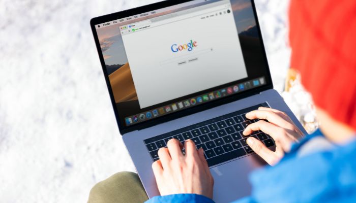 An undated image of a person using Google Search, — Canva