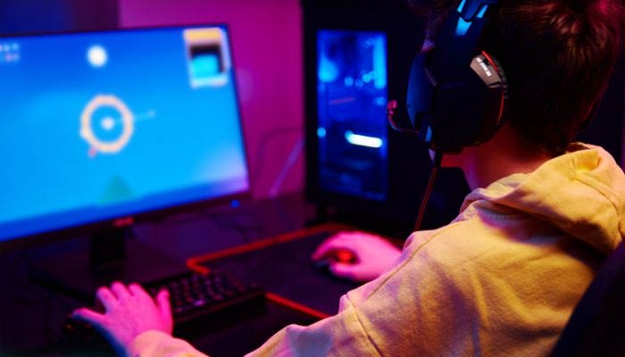 An undated image of a person playing a game. — Canva
