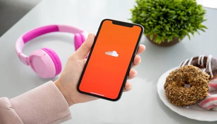 An undated image of SoundCloud logo seen on smartphone. — Depositphotos