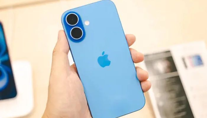 An undated image of an iPhone 16 displayed at a store. — Depositphotos