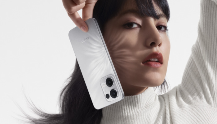 An undated image of a girl holding Oppo Reno 13. — Oppo