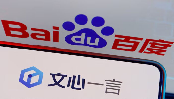 The logo of Baidus AI chatbot Ernie Bot is displayed near a screen showing the Baidu logo, in this illustration picture taken June 28, 2023. — Reuters