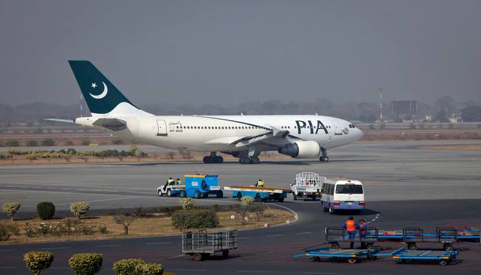 A Pakistan International Airlines (PIA) plane prepares to take-off at Alama Iqbal International Airport in Lahore February 1, 2012. — Reuters