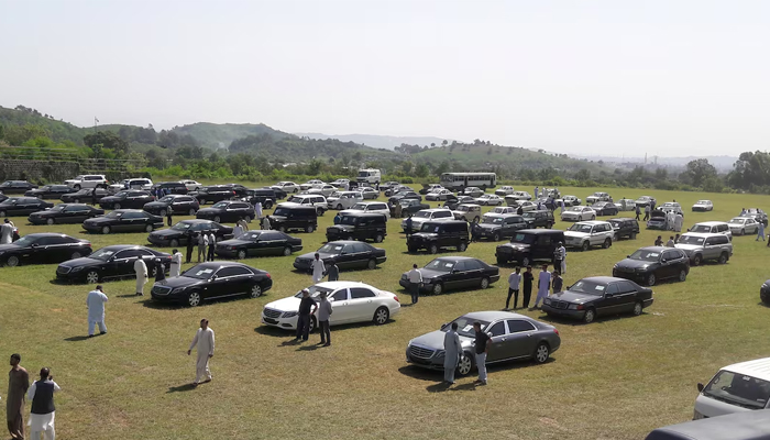 People visit an auction of government owned used cars at the premises of Prime Minister House in Islamabad, Pakistan September 17, 2018. — Reuters