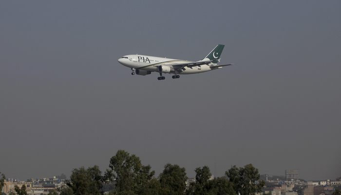 A Pakistan International Airlines (PIA) passenger plane arrives at the Benazir International airport in Islamabad, Pakistan, December 2, 2015. — Reuters/File