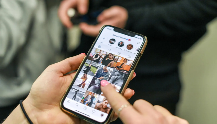 An undated image of person using Instagram. — Getty Images